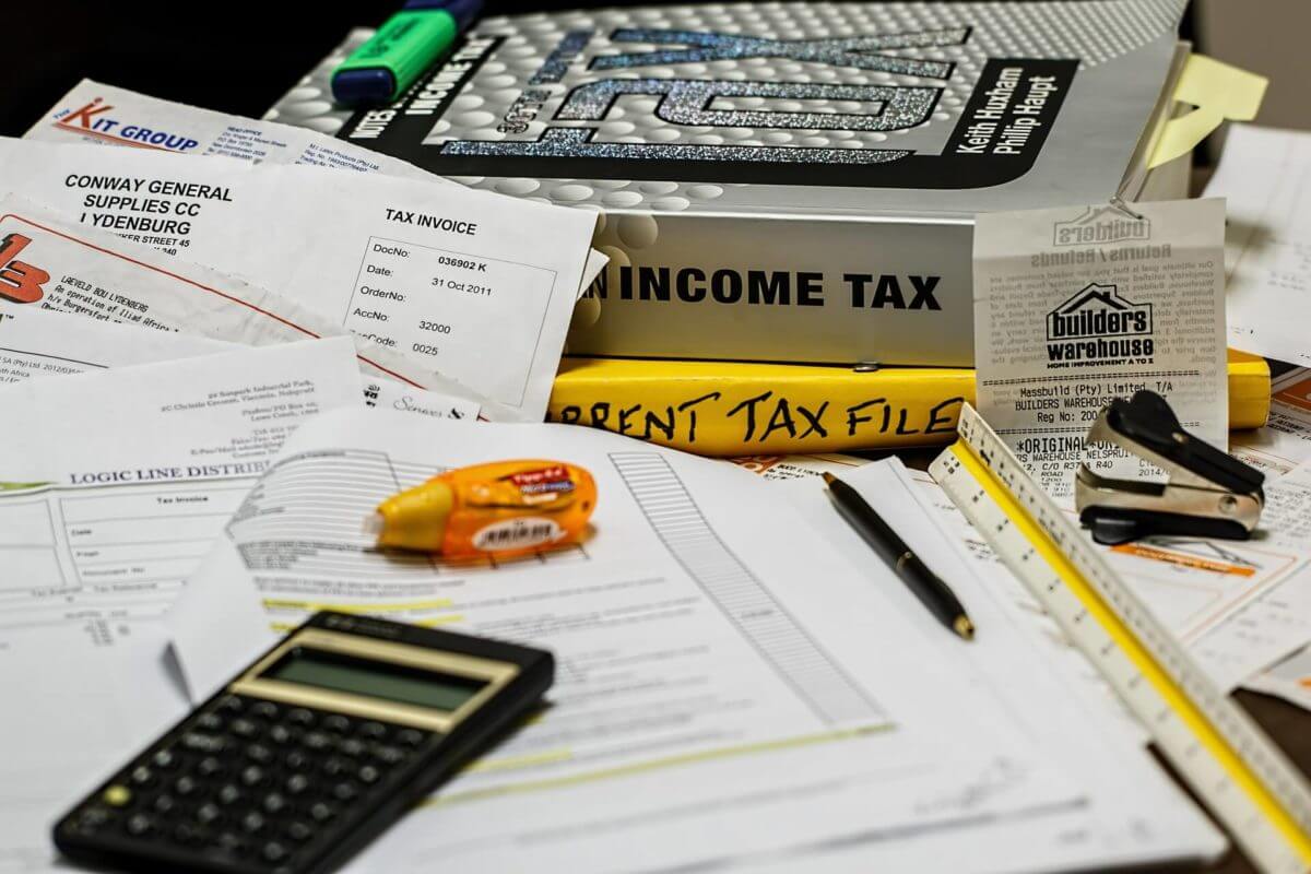 income tax, calculator and pen