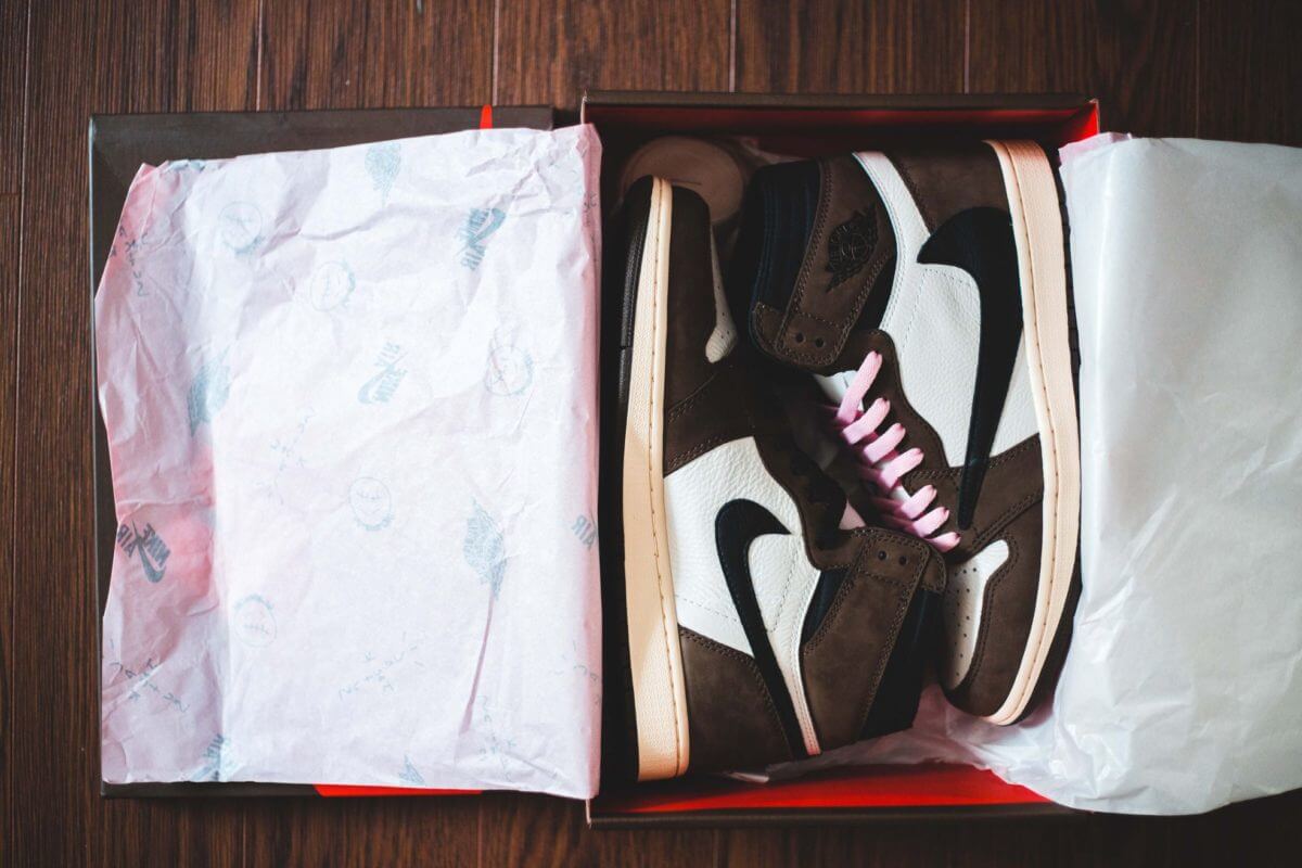 Sneakers in original package with wrapping paper