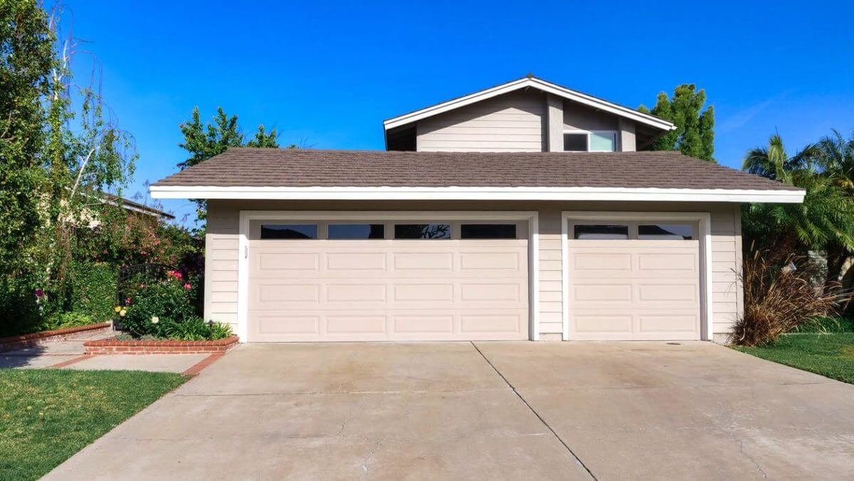 A garage with a closed-door before moving across the country