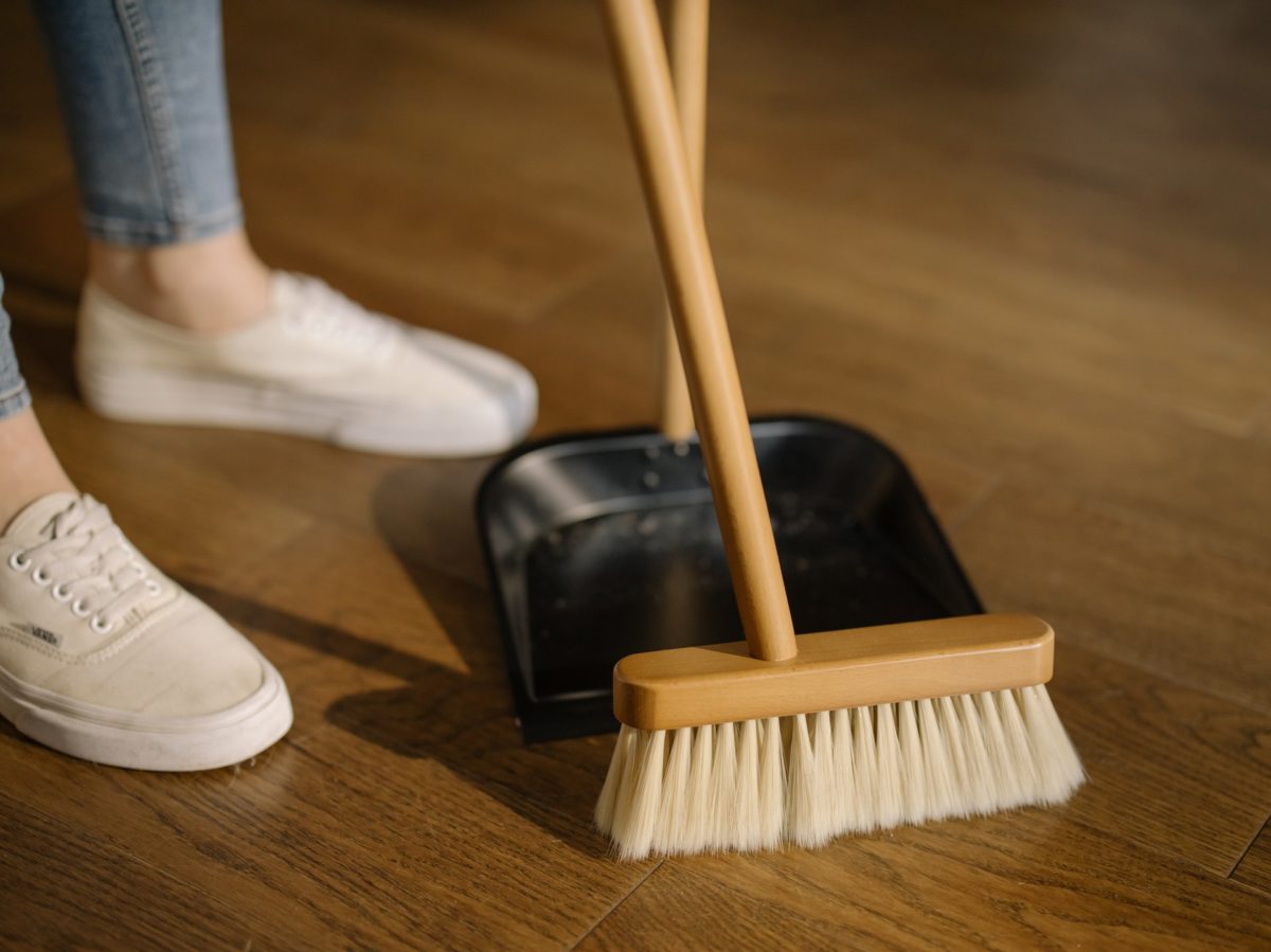 A woman cleaning the floors