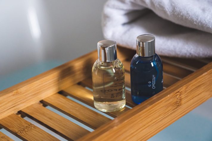 Toiletries on a wooden tray