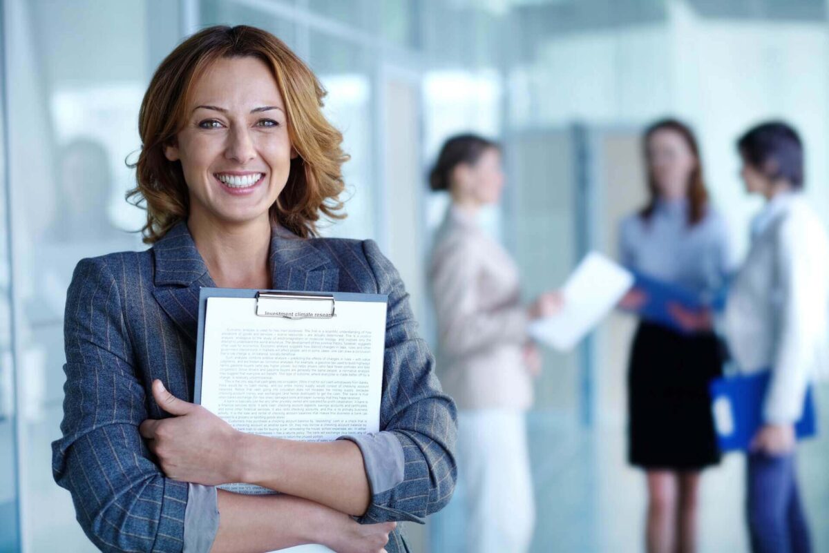 A woman smiling at a job