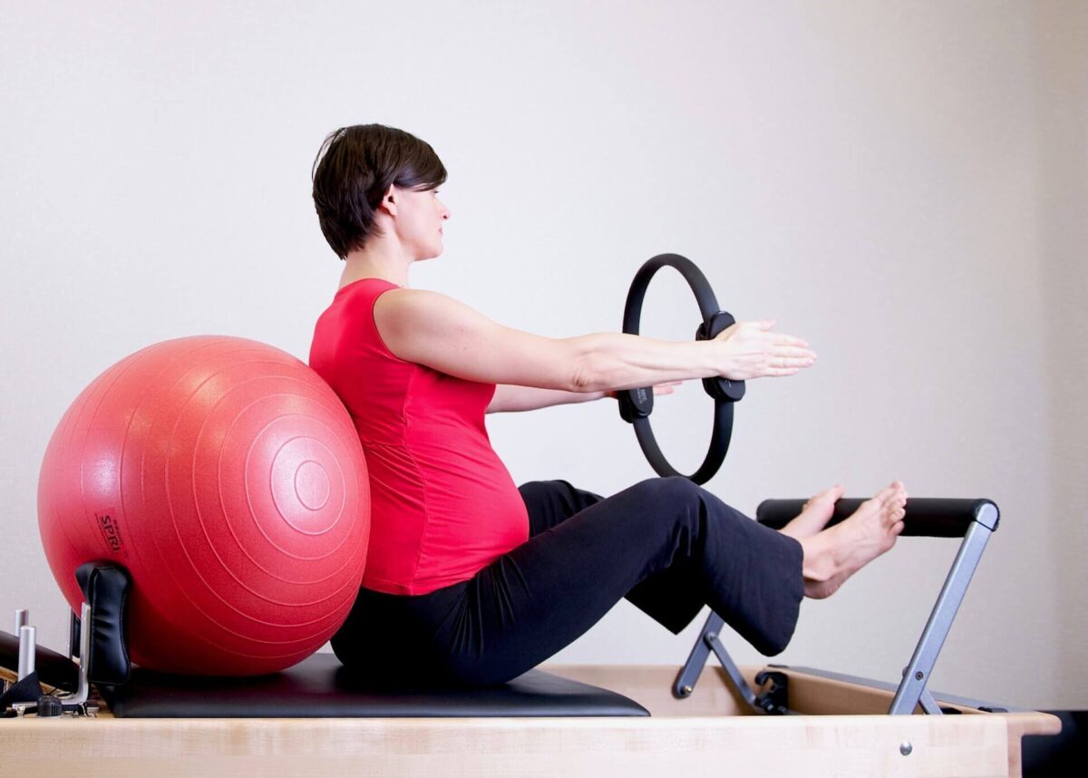 woman exercising with fitness equipement