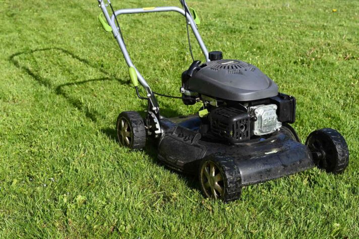 A lawn mower on the grass
