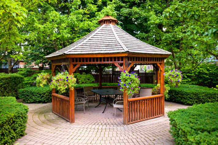 Gazebo in a garden before being disassembled for moving cross country