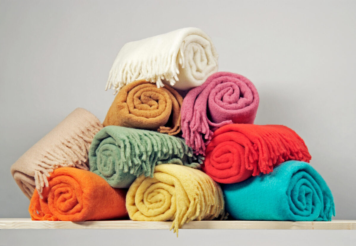 A bunch of different-colored blankets