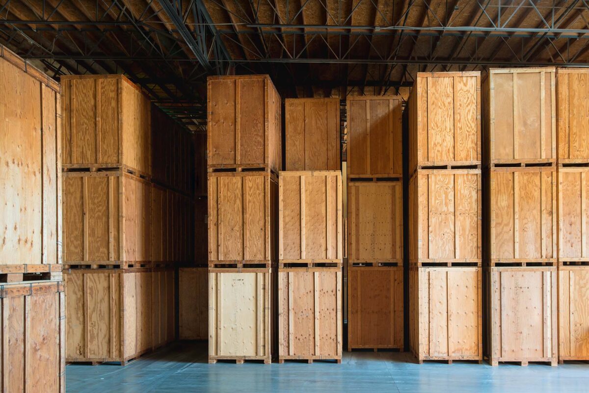 Wooden crates neatly packed in a storage