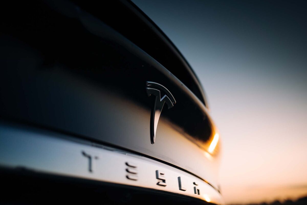 A closeup of the Tesla logo on Model X