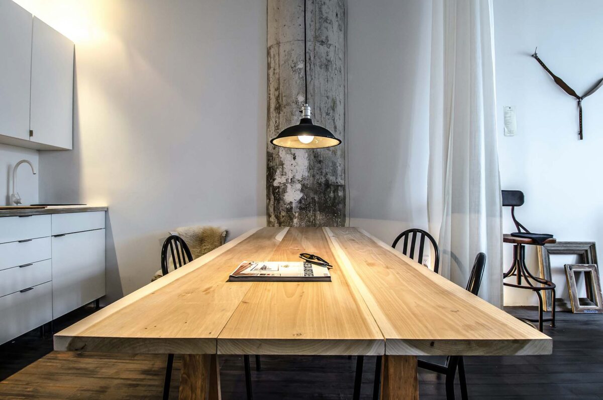A wooden table in a kitchen